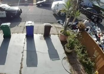 Unpaid Trash Company Empties Dumpster Rental Load On Customer's Front Lawn